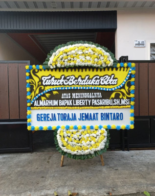 Papan Bunga Duka di Wugi