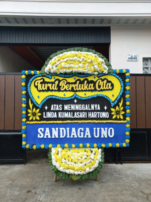 Papan Bunga Duka di Wugi